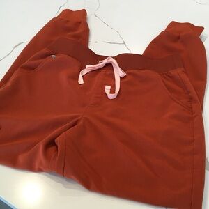 Figs Medium Burnt Orange Scrubs with Peach Drawstring Minor mark on back pocket